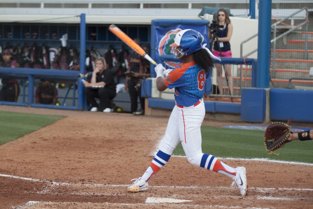 <p>Aleshia Ocasio swings during Florida's 15-8 win against Bethune-Cookman on March 29, 2017, at Katie Seashole Pressly Stadium.</p>