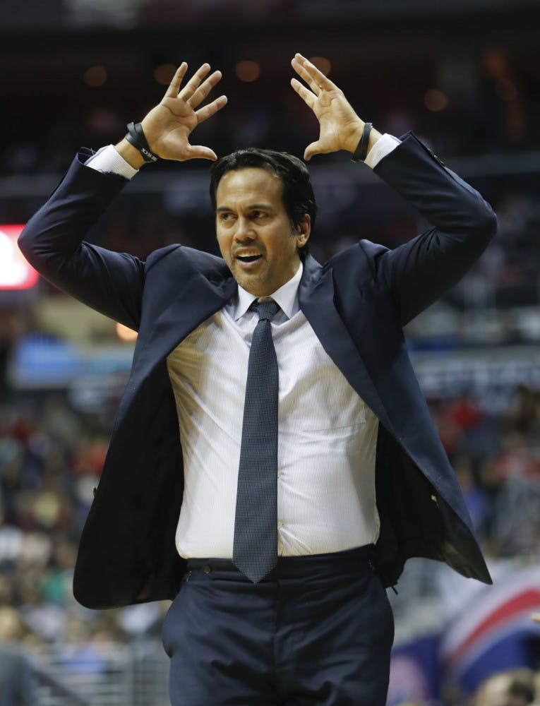 Miami Heat head coach Erik Spoelstra reacts during the closing minutes of the second half of an NBA basketball game Washington Wizards in Washington, Saturday, April 8, 2017. Miami won 106-103. (AP Photo/Pablo Martinez Monsivais)