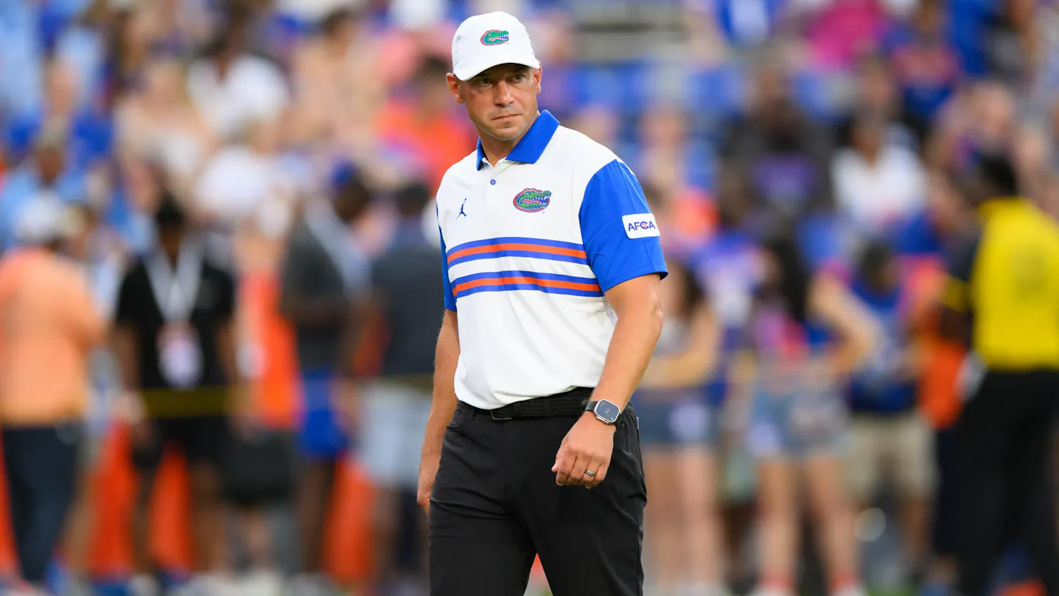 Florida head coach Jon Sumrall watches warmups before an NCAA college football game against FAU, Saturday, Sept. 5, 2026, in Gainesville, Fla.