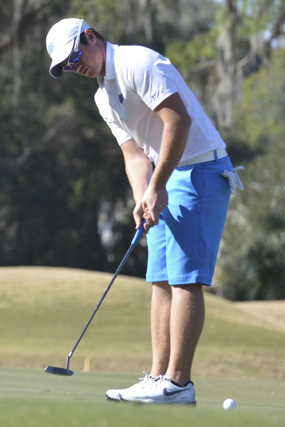 Sam Horsfield watches his ball roll toward the cup during Day 1 of the SunTrust Gator Invitational on Feb. 20, 2016, at the Mark Bostick Golf Course.
