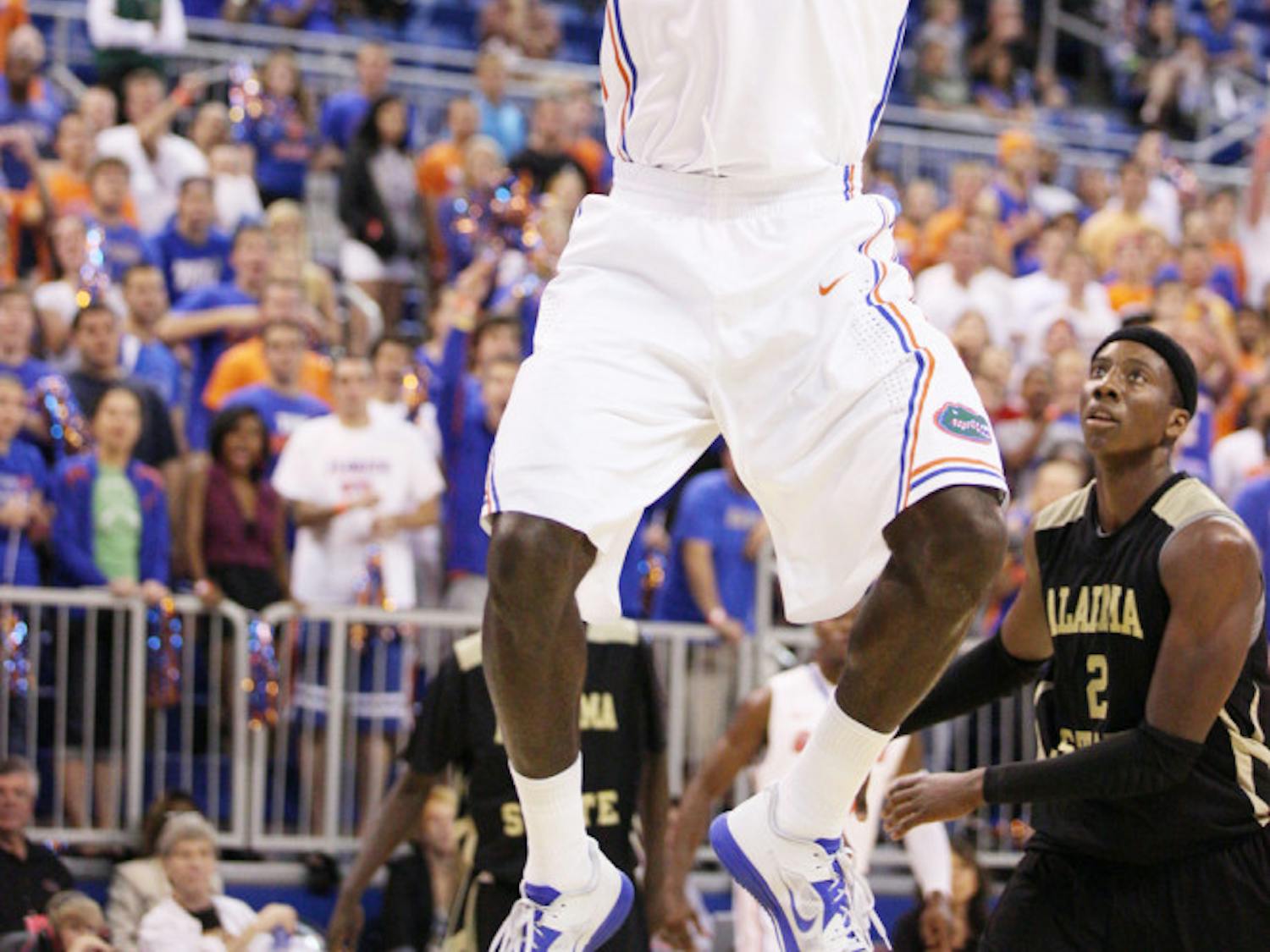 Florida center Patric Young (4) dunks the ball during an 84-35 win  against Alabama State on Nov. 11 at the O’Connell Center. Young scored 12 points and grabbed 12 rebounds in the victory.
