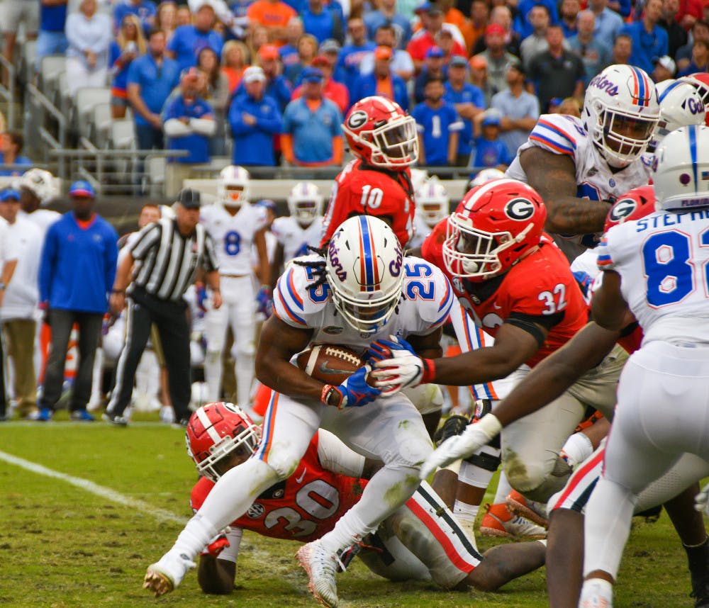 <p>Running back Jordan Scarlett fumbled on his first rushing attempt of the afternoon. He ended the day with 56 yards on eight carries. </p>