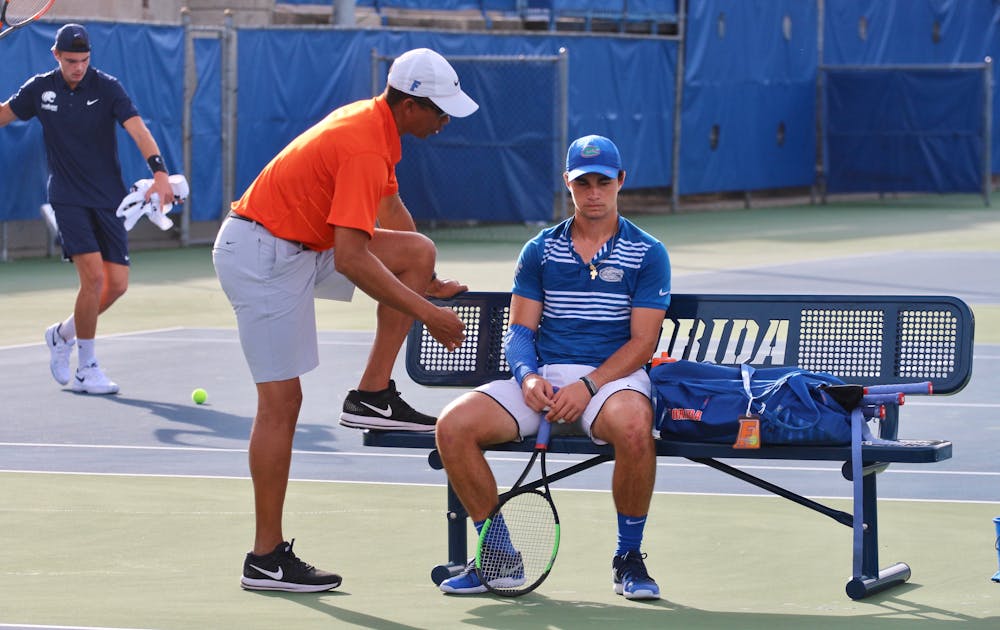 <p>Coach Bryan Shelton (left) and freshman Duarte Vale (right) came up short in the Gators' second dual match on the weekend in Columbus, Ohio. </p>