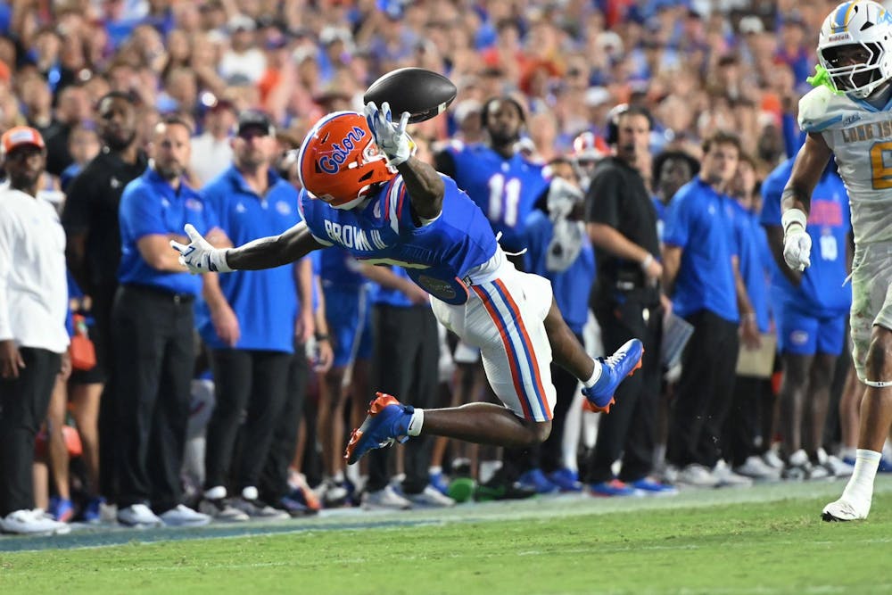 <p>Florida Gators wide receiver Vernell Brown III (8) makes a diving catch during a football game between the Long Island Sharks and the Florida Gators on Saturday, Aug. 30, 2025, at Ben Hill Griffin Stadium in Gainesville, Fla.</p>