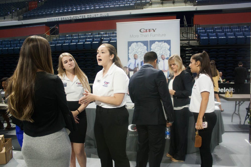<p><span id="docs-internal-guid-8454dda2-c1b1-f3fa-a7c1-217d0a2f14a4"><span>Companies like City Furniture</span> <span>and many more provided booths where students were able to speak with future employers at the Career Showcase.</span></span></p>