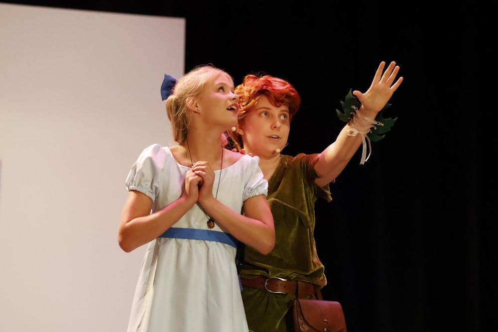 Kinley Murray and Clara J. Foltz costar in Alachua Children’s Theater’s rendition of Peter Pan as Wendy and Peter Pan respectively at Santa Fe high school on Friday, June 14, 2024.