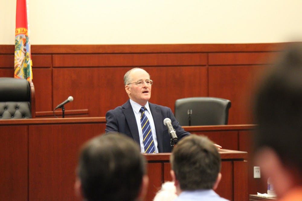 Florida Supreme Court Justice Charles Canady talks to UF Law students about the decision making process in the courts. 