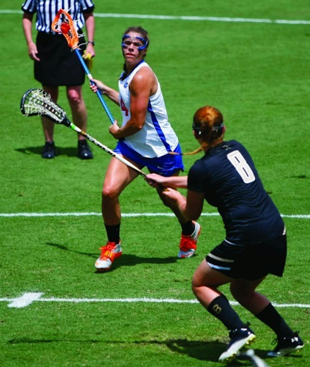 <p>Florida attacker Kitty Cullen takes a shot against Vanderbilt on April 14. Cullen has scored nine goals since returning from a concussion.</p>