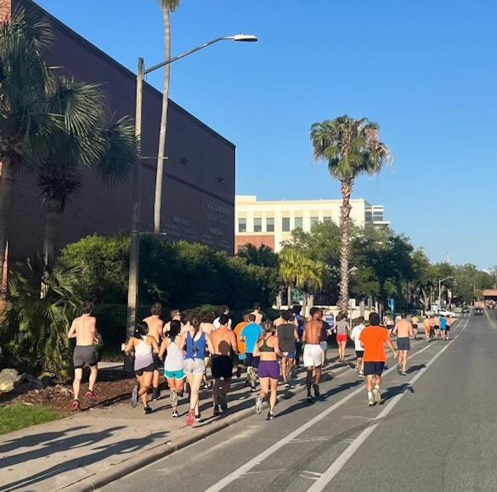 <p>Florida Running Club runs a long run across UF’s campus on Saturday, April 20, 2024.</p>