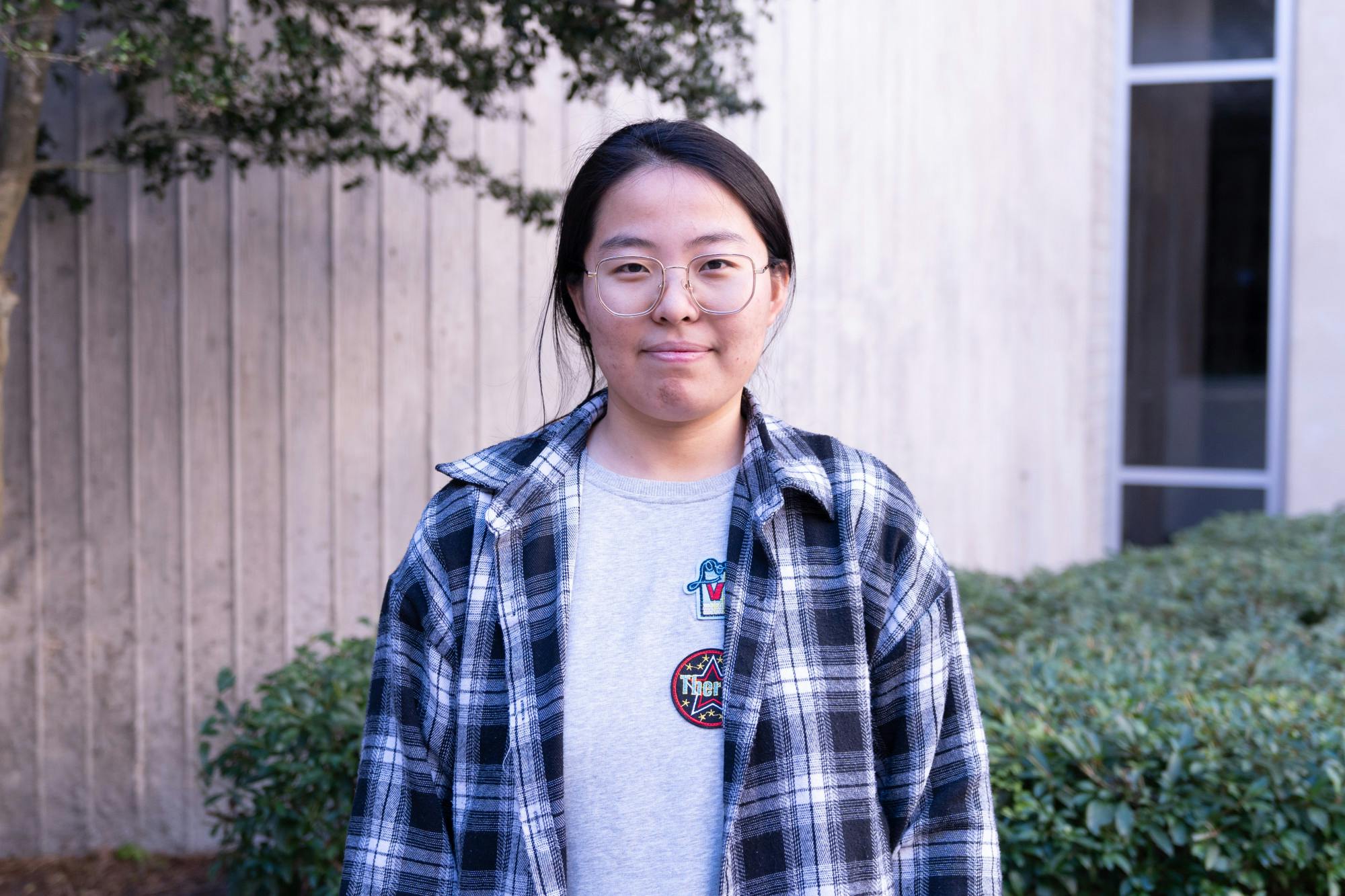 First-year international law student Winxin Feng stands outside UF Levin College of Law on Sunday, Jan. 28, 2024.