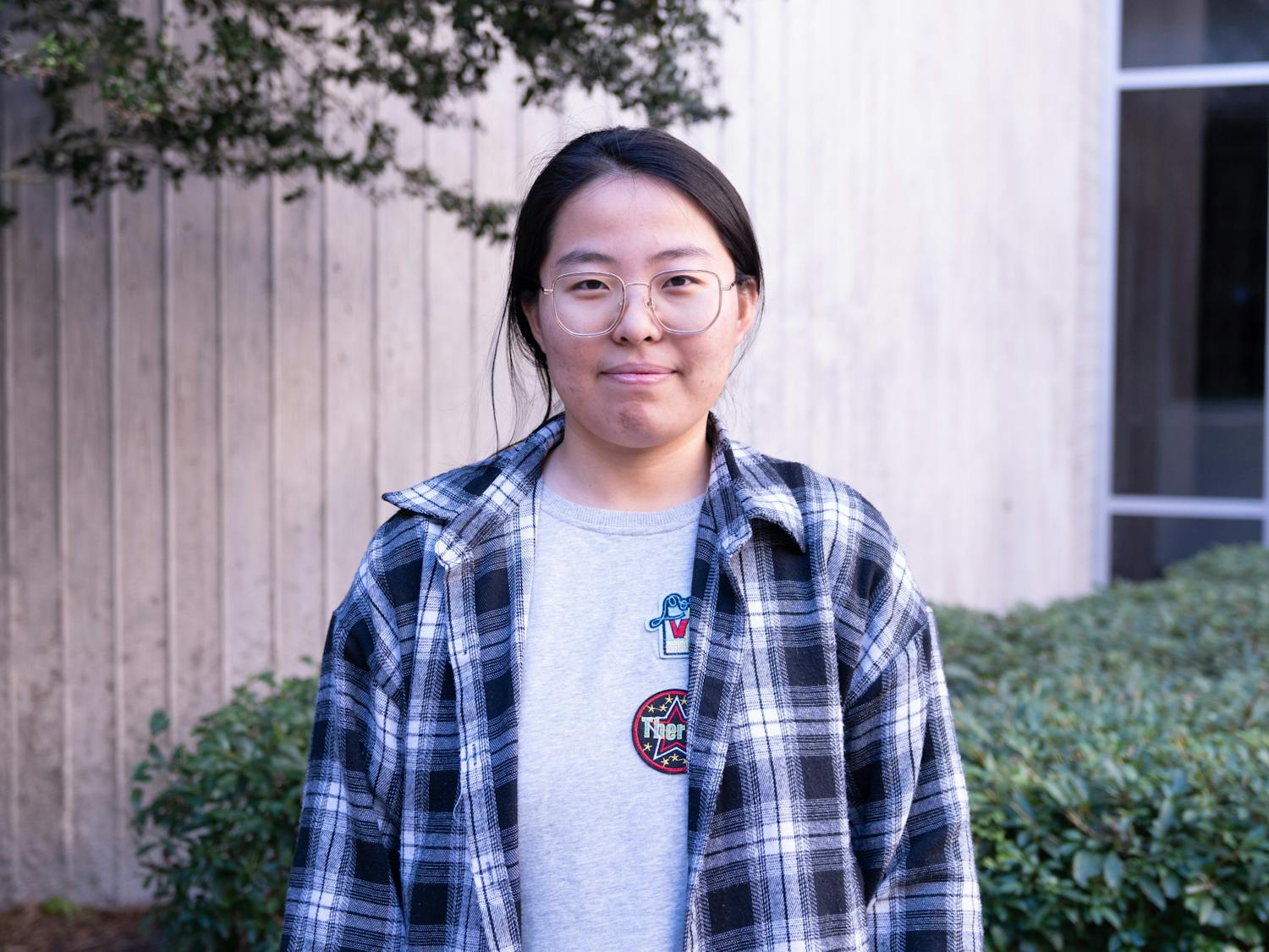First-year international law student Winxin Feng stands outside UF Levin College of Law on Sunday, Jan. 28, 2024.