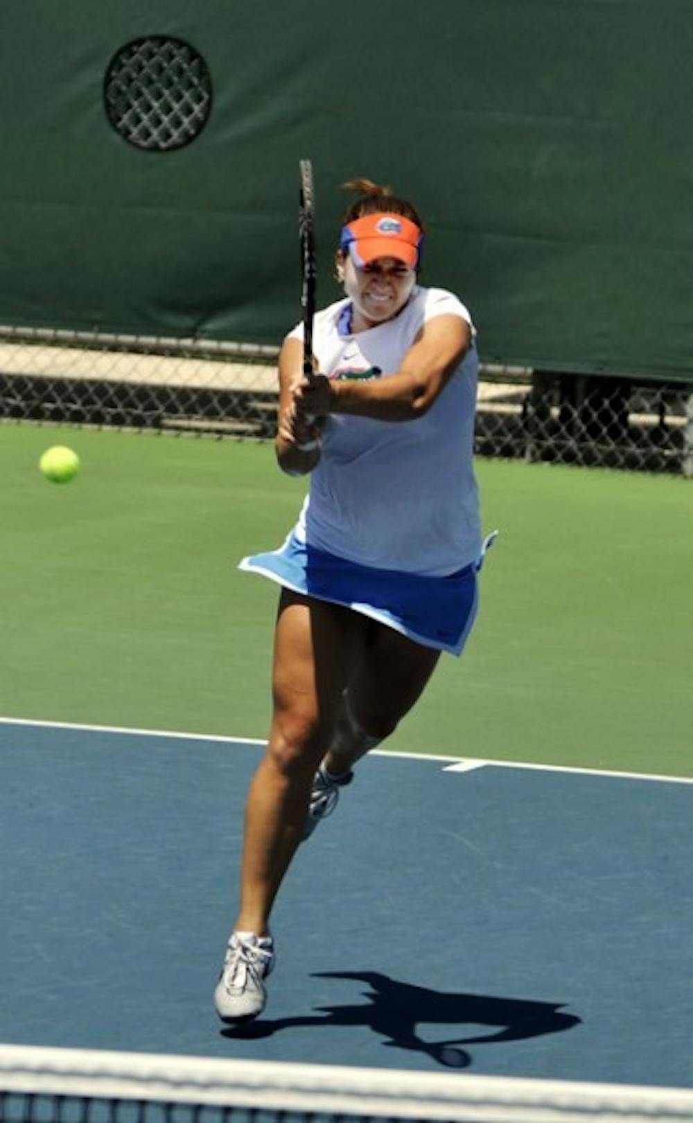 <p>Alexandra Cercone returns a volley. Cercone propelled Florida to a 7-0 victory against South Carolina on Saturday.&nbsp;</p>