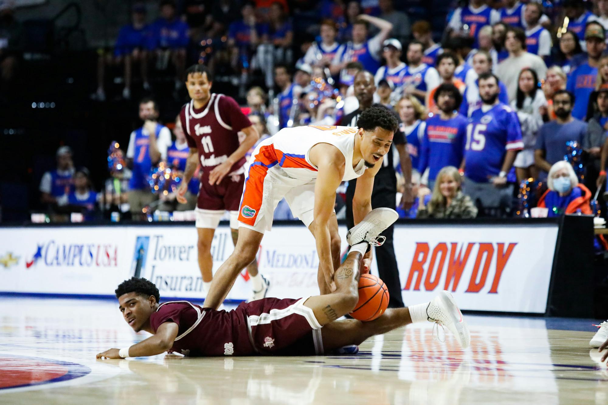 Florida's Myreon Jones gets tangles with a Texas Southern player during the Gators' loss on Dec. 6.