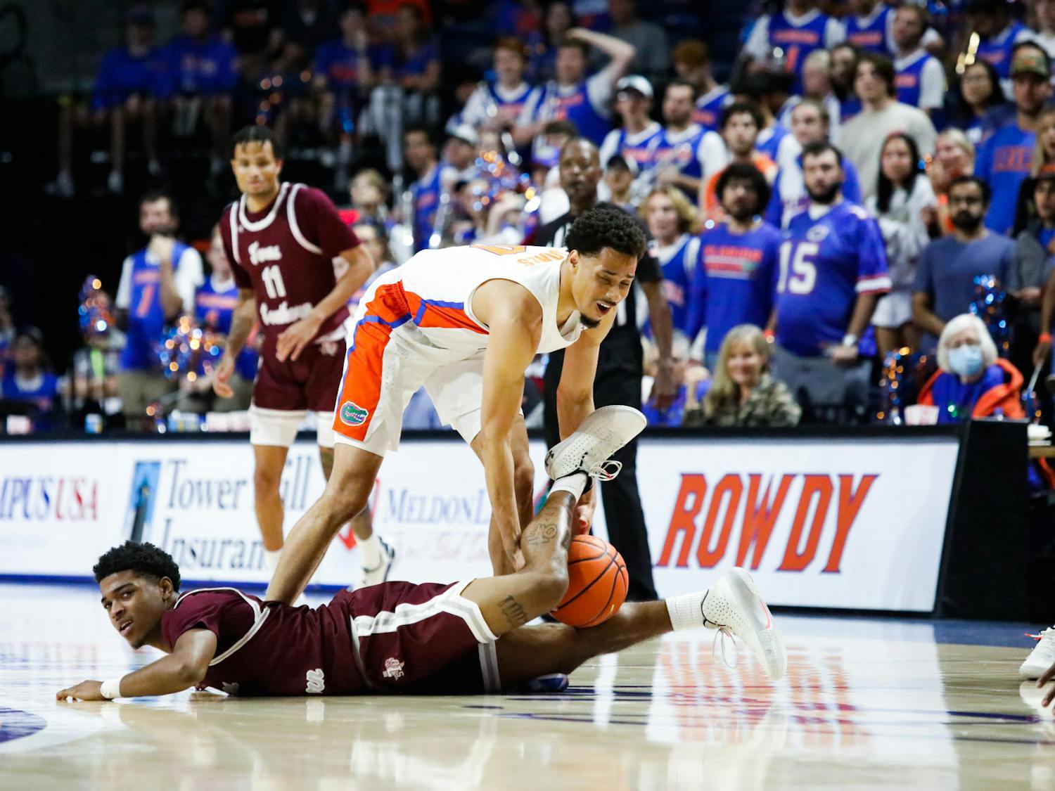 Florida's Myreon Jones gets tangles with a Texas Southern player during the Gators' loss on Dec. 6.