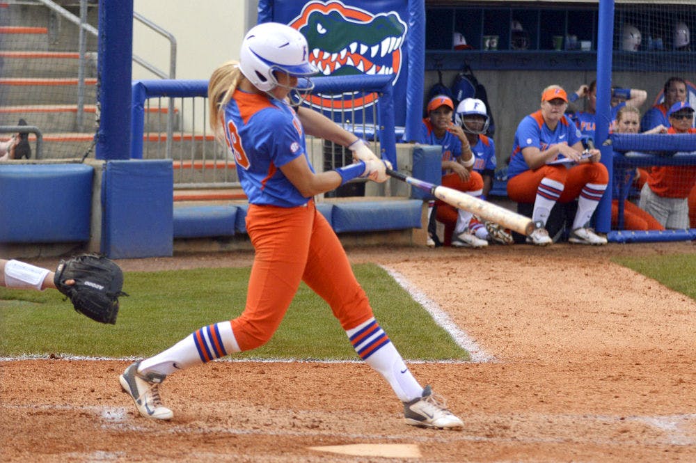 <p>Taylor Schwarz hit Florida's first home run of the season in the third inning of the Gators' 11-1 win against USF in Tampa on Sunday.</p>