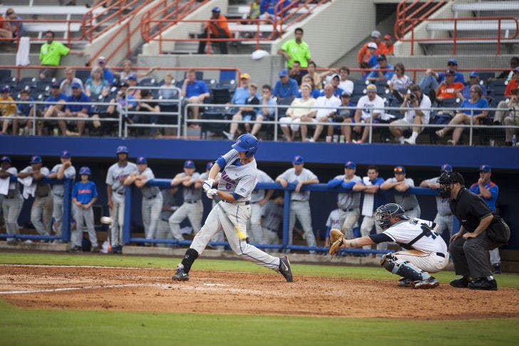 Zack Powers swings at a pitch during Florida's 5-2 loss to North Carolina on Saturday in McKethan Stadium.