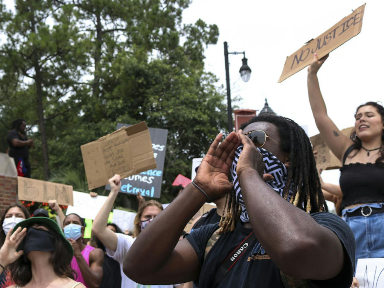 Morris McFadden, a 21-year-old telecommunications and production major and one of the organizers of the protest, shouts with the crowd of about 100 people June 3 at the intersection of 13th Street and University Avenue as part of a protest against police brutality.
&nbsp;