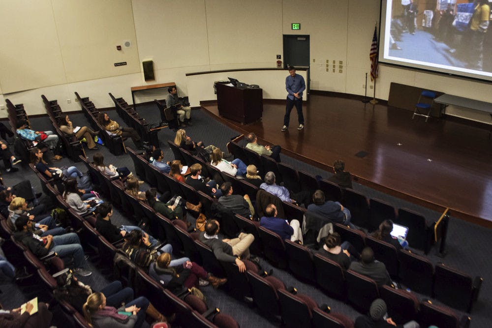 Mark Lynas, an author, environmental activist and visiting fellow at Cornell University, gives his presentation, “GMOs are Green: How an Environmentalist Changed His Mind on Biotechnology” to students in the Health Professions, Nursing and Pharmacy Auditorium on Thursday, Jan. 8.