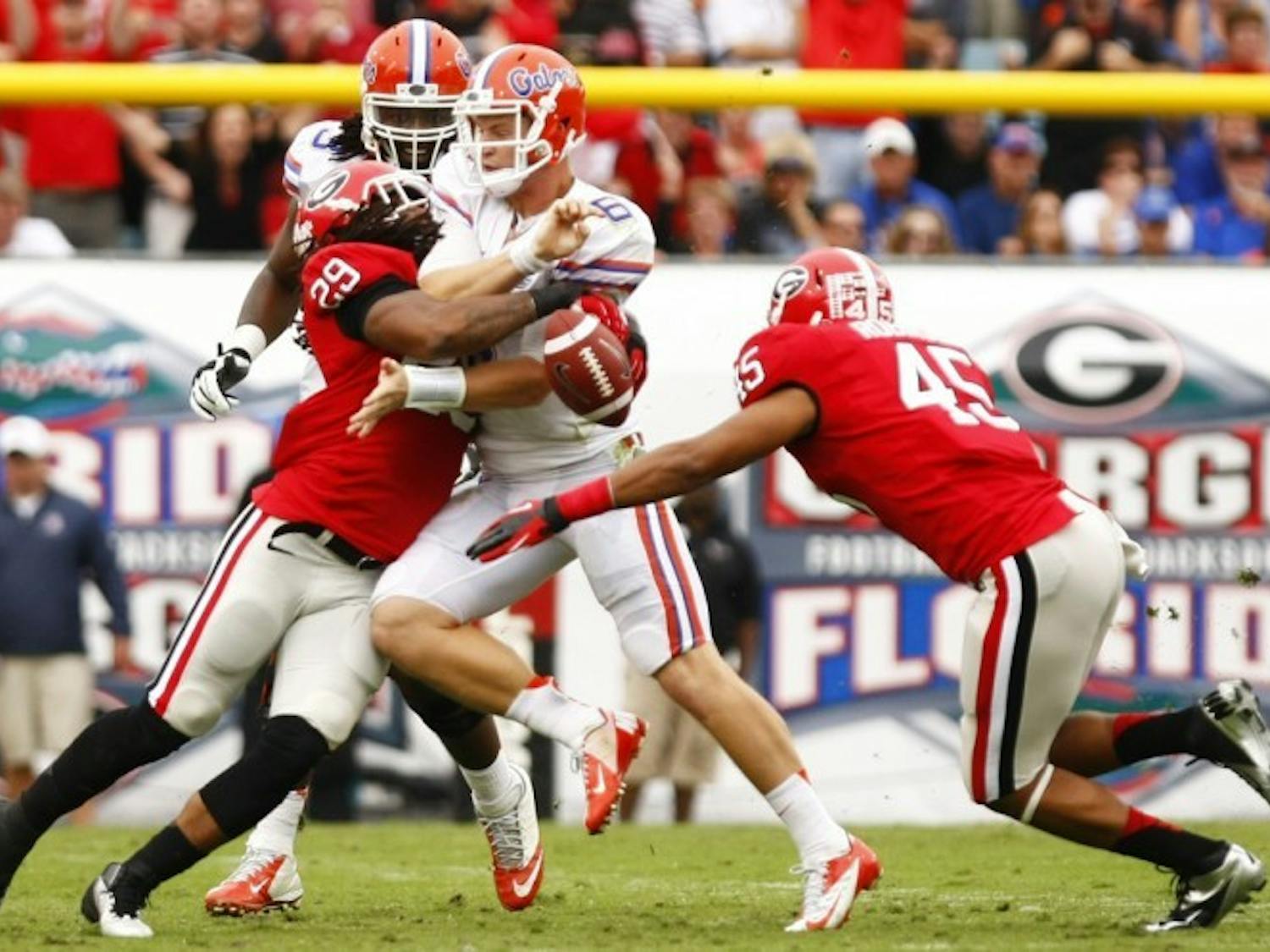 Sophomore quarterback Jeff Driskel (6) loses possession of the ball while being sacked by Georgia linebacker Jarvis Jones (29) during Florida’s 17-9 loss on Saturday at EverBank Field in Jacksonville.
