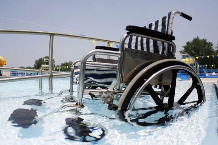 The beach entry wheelchair ramp at Dwight H. Hunter Municipal Pool, also know as the Northeast Pool, is one of two soon-to-be required methods of entry for people with disabilities as part of the Americans with Disabilities Act.