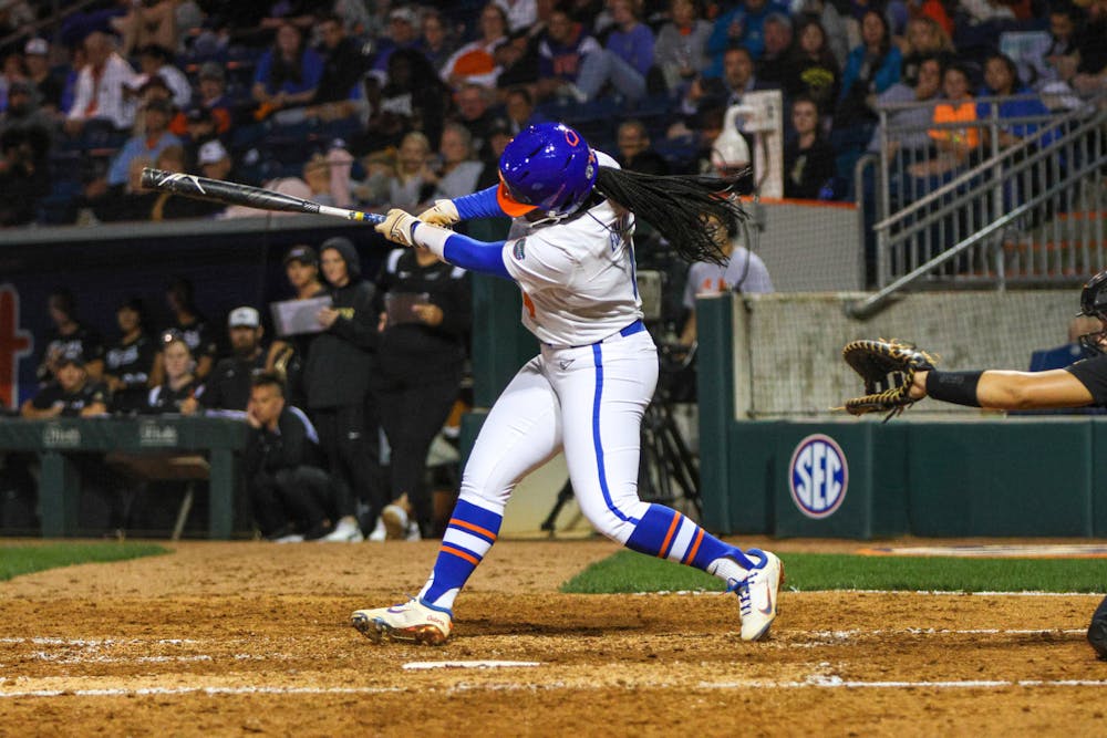 Florida third baseman Charla Echols hits the ball in the Gators' 11-0 win against the Jacksonville Dolphins Wednesday, Feb. 15, 2023.