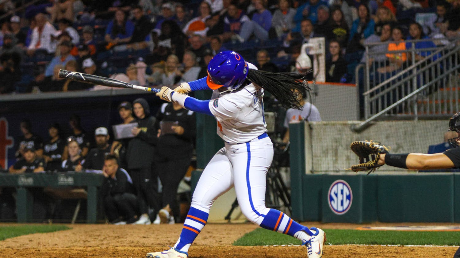 Florida third baseman Charla Echols hits the ball in the Gators' 11-0 win against the Jacksonville Dolphins Wednesday, Feb. 15, 2023.