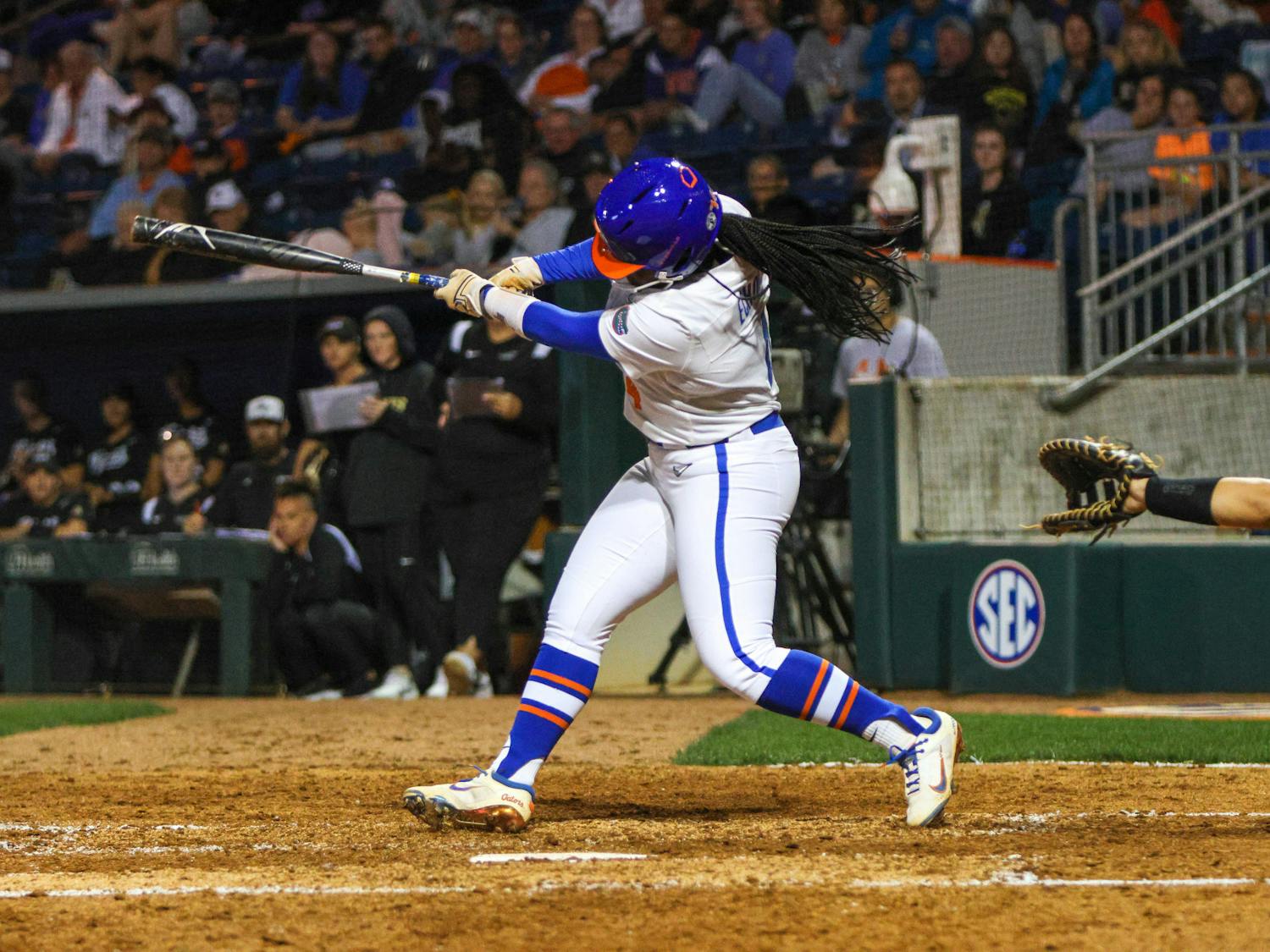 Florida third baseman Charla Echols hits the ball in the Gators' 11-0 win against the Jacksonville Dolphins Wednesday, Feb. 15, 2023.