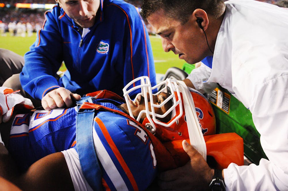 <p>Gators sophomore linebacker Darrin Kitchens is carted off the field during the third quarter of Saturday’s loss to the Seminoles after suffering an injury during a kickoff return.</p>
