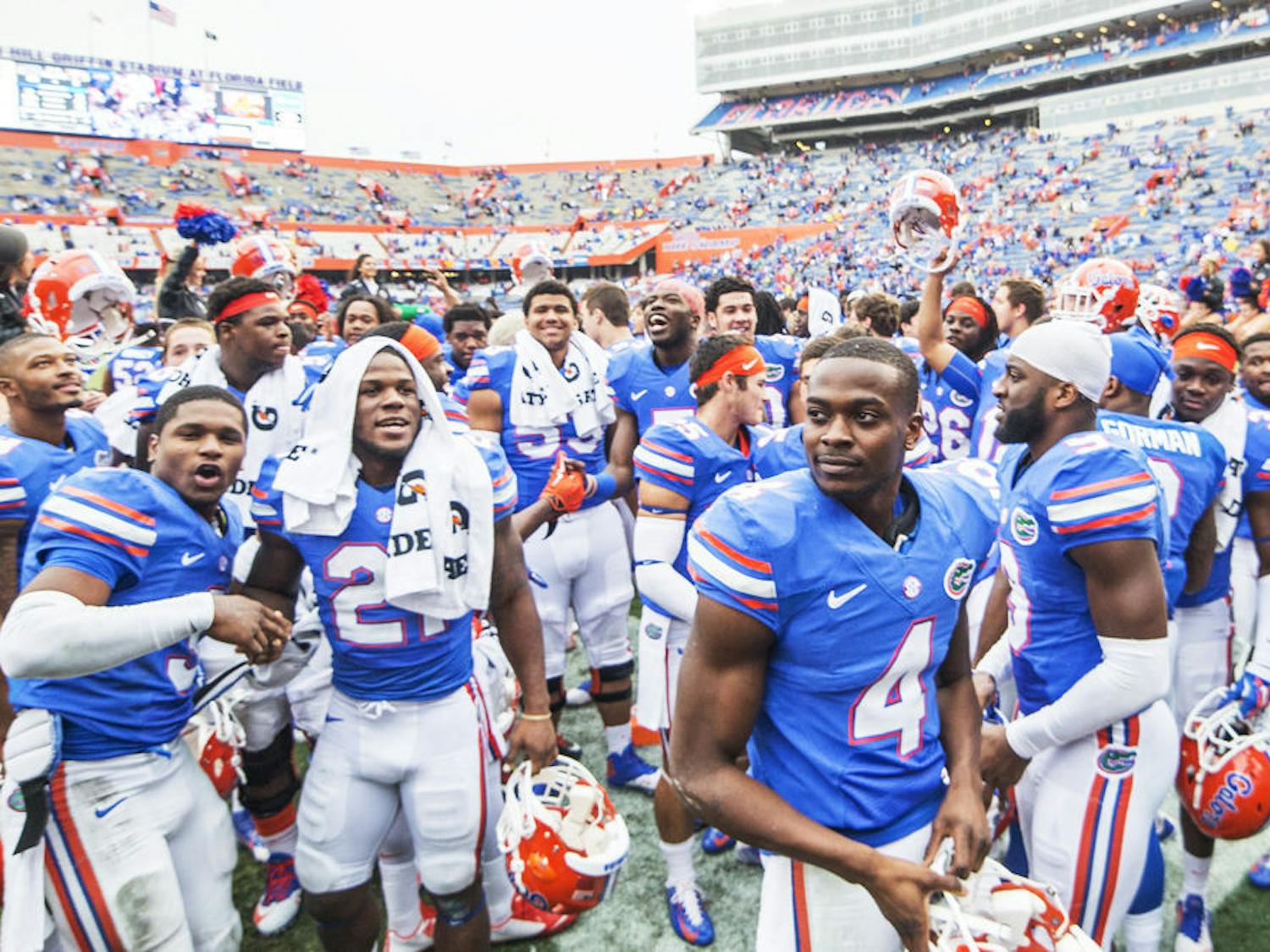 UF players celebrate following Florida's 52-3 win against Eastern Kentucky on Saturday at Ben Hill Griffin Stadium.