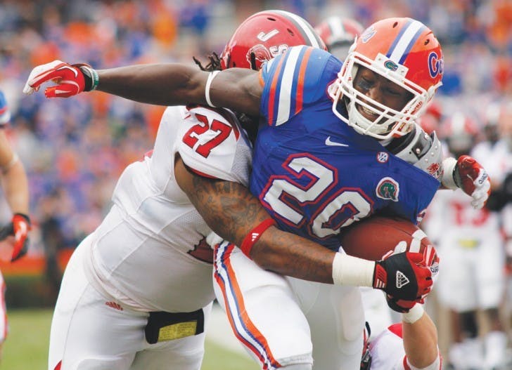 Omarius Hines pushes toward the end zone after catching a screen pass during the second quarter of Florida’s 23-0 win against Jacksonville State on Saturday at Ben Hill Griffin Stadium.
