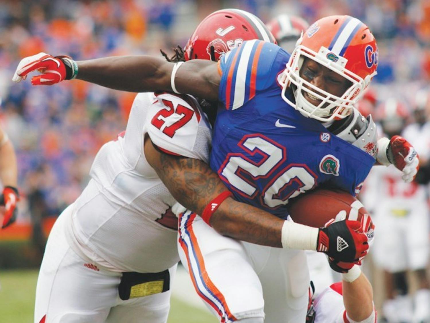 Omarius Hines pushes toward the end zone after catching a screen pass during the second quarter of Florida’s 23-0 win against Jacksonville State on Saturday at Ben Hill Griffin Stadium.