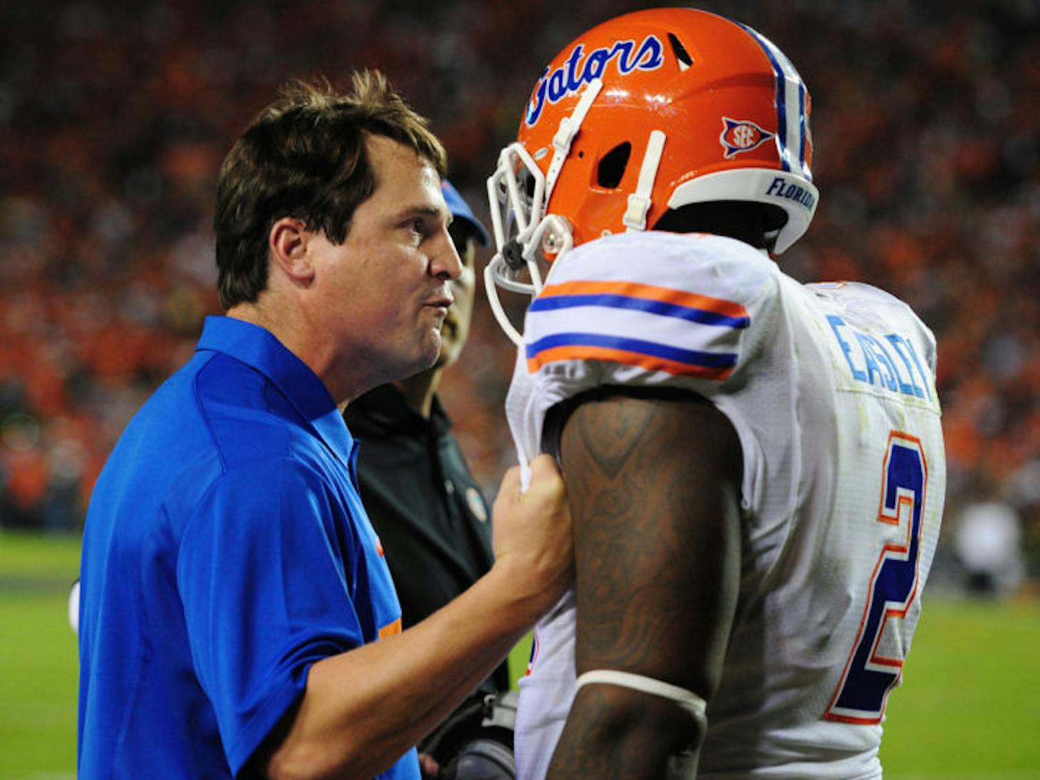 Will Muschamp speaks with senior defensive tackle Dominique Easley during Florida’s 17-6 loss to Auburn on Oct. 15, 2011, at Jordan-Hare Stadium. Easley recorded a team-leading four sacks in 2012.