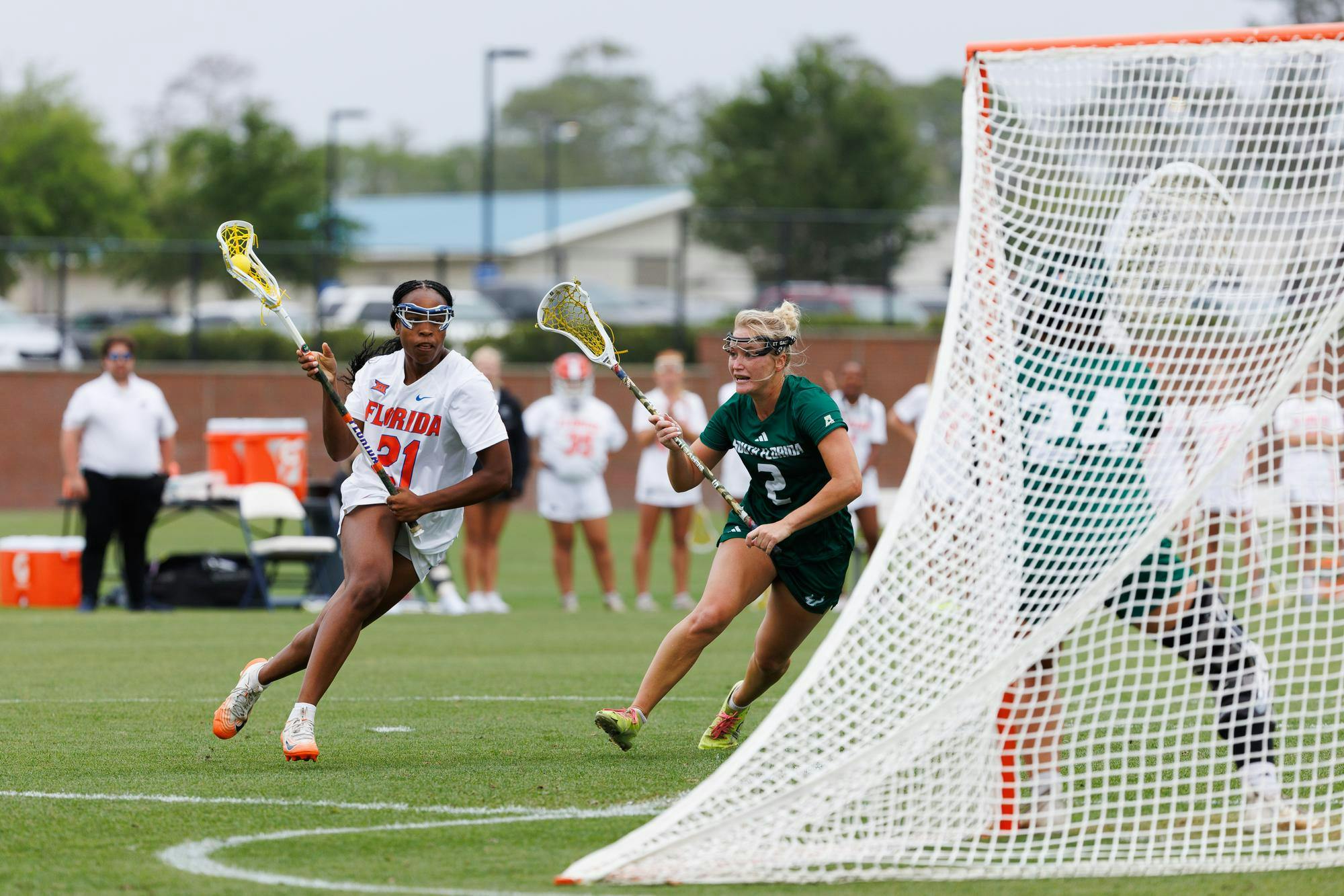 Florida attacker Clark Hamilton (21) runs toward the goal during an NCAA Lacrosse game against South Florida, Wednesday, April 8, 2026, in Gainesville, Fla.