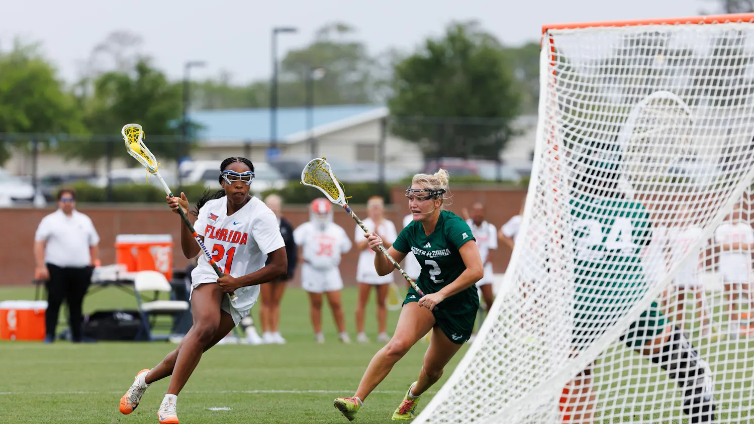Florida attacker Clark Hamilton (21) runs toward the goal during an NCAA Lacrosse game against South Florida, Wednesday, April 8, 2026, in Gainesville, Fla.