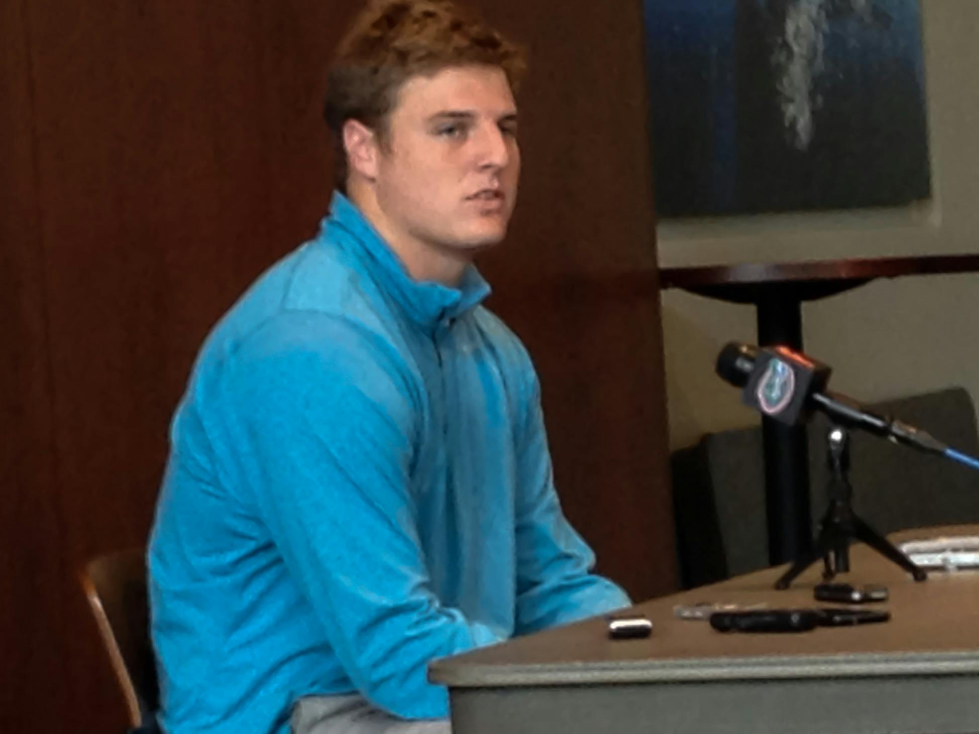 Tight end Jake McGee speaks to reporters on Thursday. McGee, a Virginia transfer, led the Cavaliers in receptions and receiving yards in 2013.
