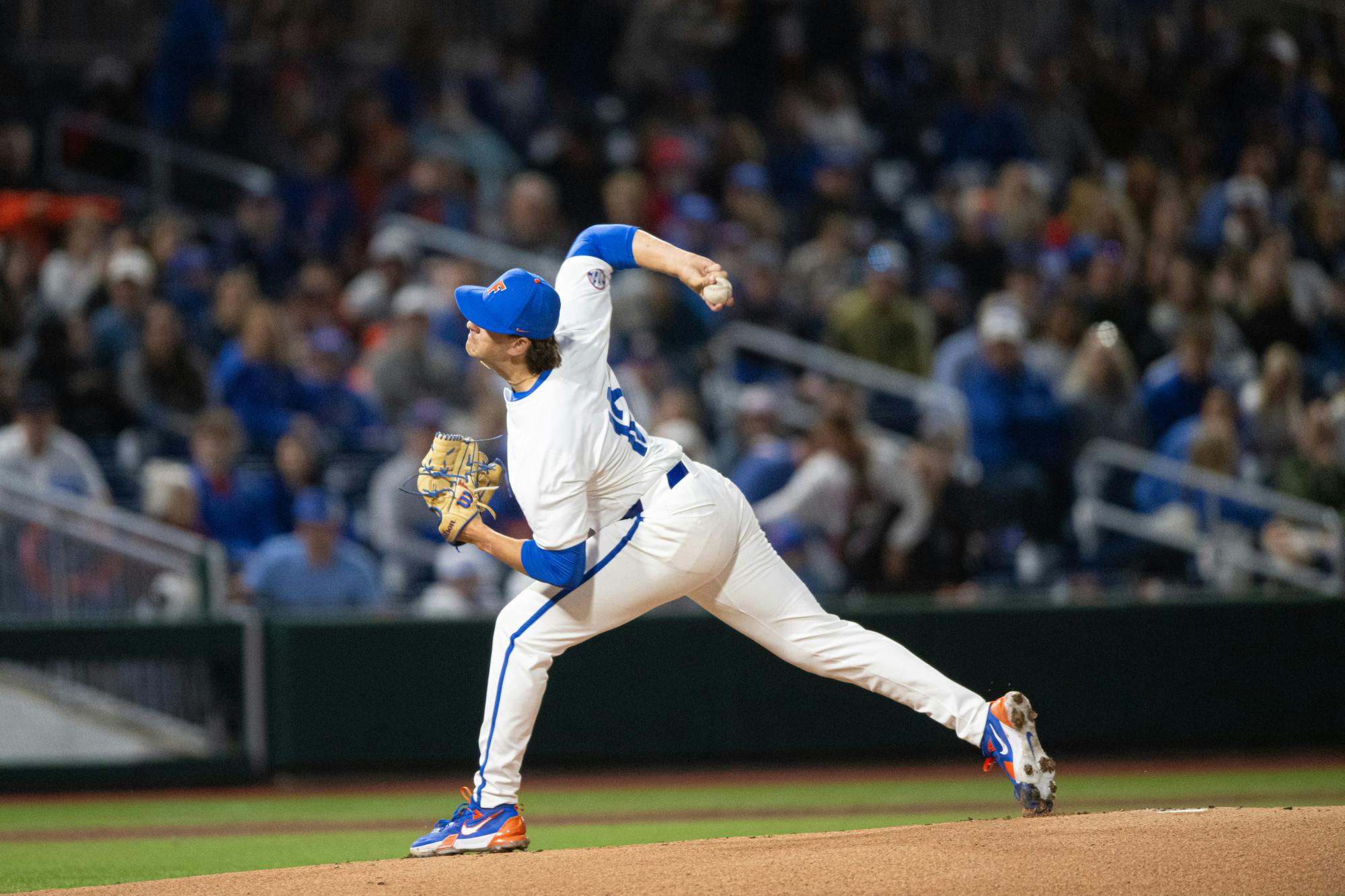 Florida Gators pitcher Liam Peterson (12) throws the first pitch in a baseball game against the Air Force Academy in Gainesville, Fla., on Friday, Feb. 14, 2025.