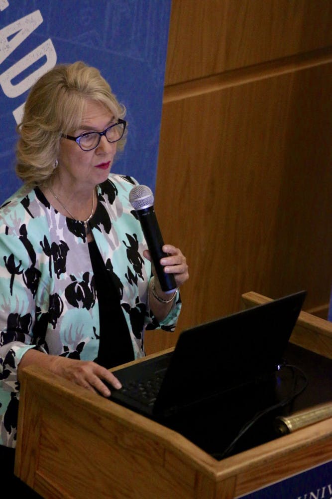 Susan MacManus, 71, speaks at the 2018 Election Wrap Up event in Pugh Hall on Tuesday night. MacManus is a professor emeritus at the University of South Florida, as well as a member of the Bob Graham Center Council of Advisors. The event, which focused on analyzing many facets of the midterm election, was sponsored by the Bob Graham Center and the League of Women Voters of Alachua County/Gainesville. One thing that MacManus honed in on was the shift from elections being dominated by baby boomers to elections being more evenly split among generations. "We're seeing a generational transformation of Florida's electorate," said MacManus.
&nbsp;