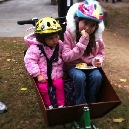 My daughter, Paisley Hewitt, and my 7-year-old cousin, Gabriella Fox, enjoyed riding around Charleston in the front cargo bin of my new bike.