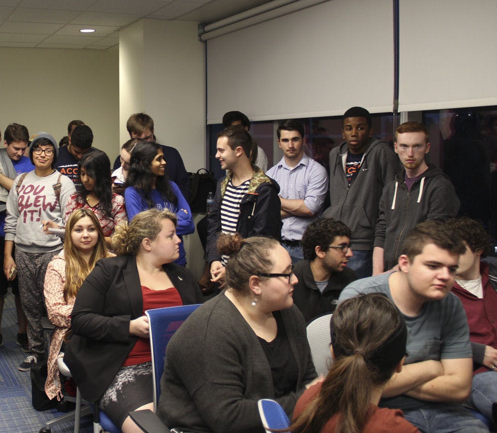 A crowd waits in room 2103 in the new Reitz Union to hear the University of Florida’s Supreme Court confer on the online voting article.