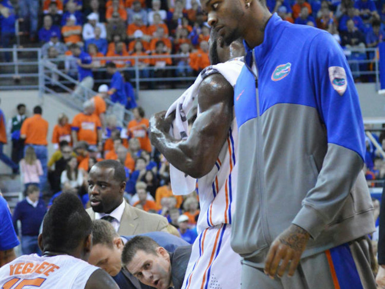 Chris Walker stands on the sideline as the Gators warm up during Florida’s win against Tennessee on Saturday in the O’Connell Center.