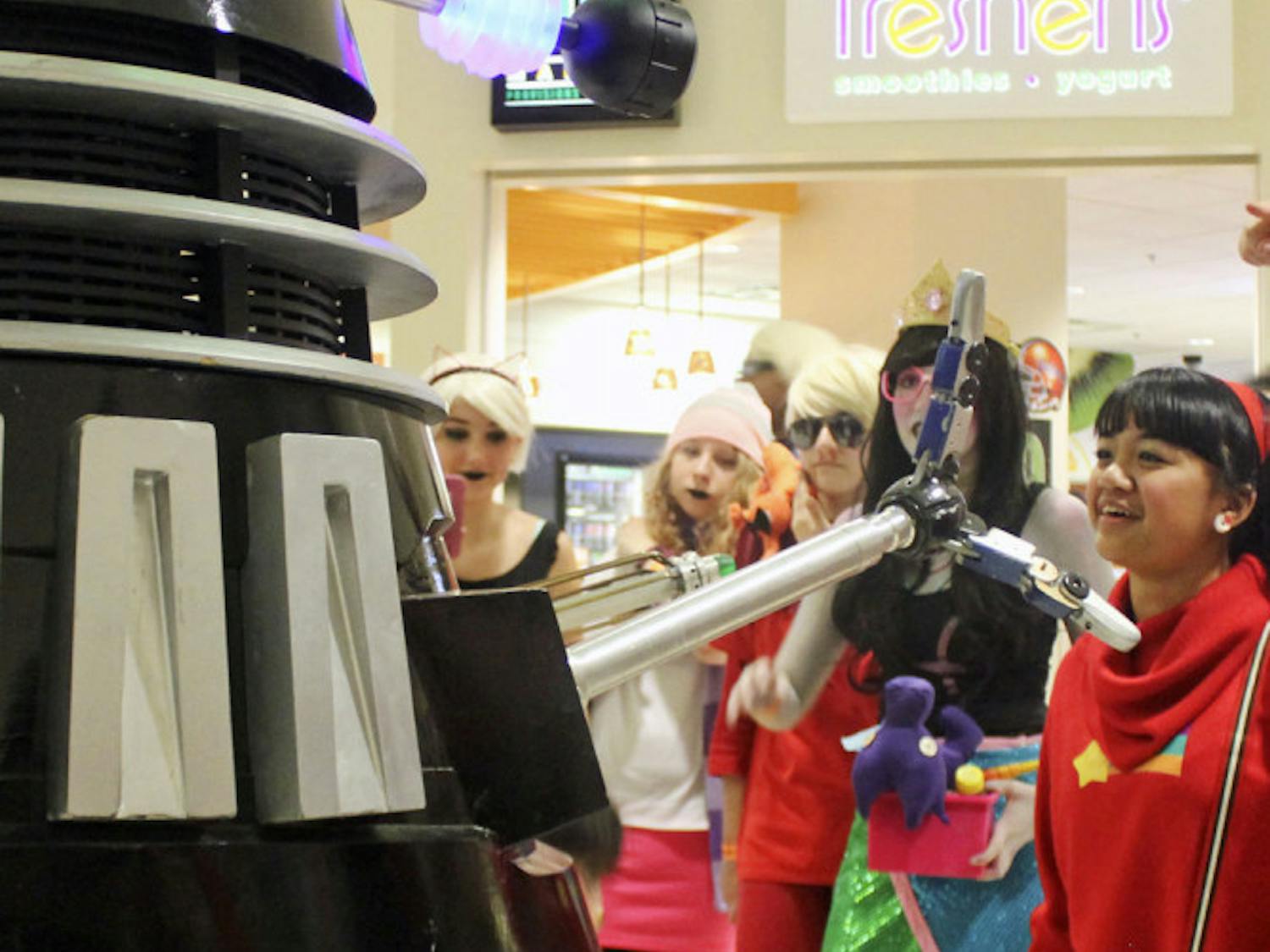 A Dalek, a creature from the British television program Doctor Who, roams through the Reitz Union on Saturday during SwampCon. The convention was attended by people dressed up as characters from different fictional series.