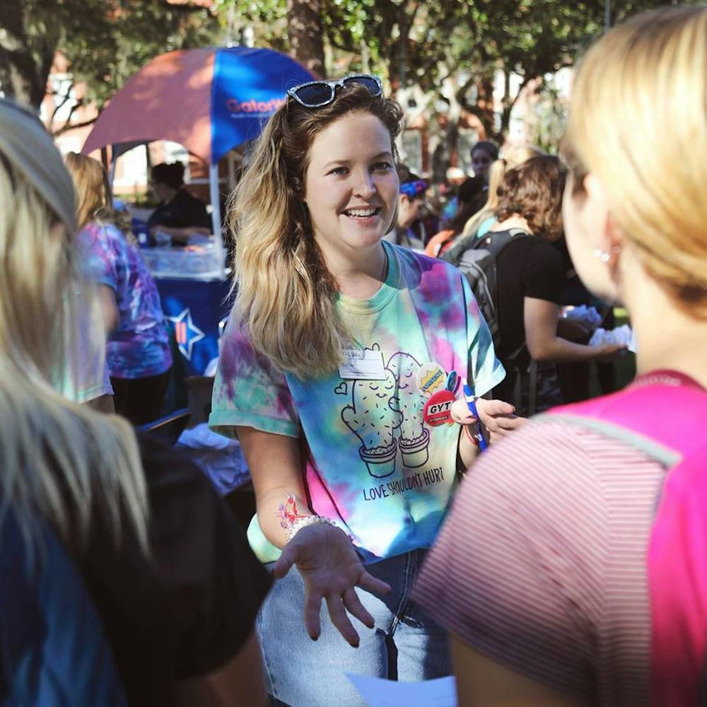 <p dir="ltr"><span>Marie McGrath, a STRIVE lead peer educator, tells students about the fair’s T-shirts. “We had this idea for the cactus shirt, because a) succulents are so hot right now,” McGrath said. “Also, you can have prickly feelings, but that doesn’t mean you have to hurt your partner.”</span></p>
<p><span>&nbsp;</span></p>