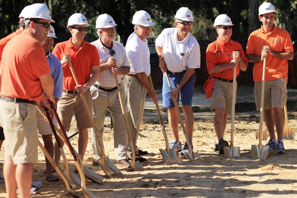 <p>Several members who were key to the construction and planning of the new Theta Chi Fraternity House take part in a formal groundbreaking ceremony Saturday on Fraternity Row.</p>