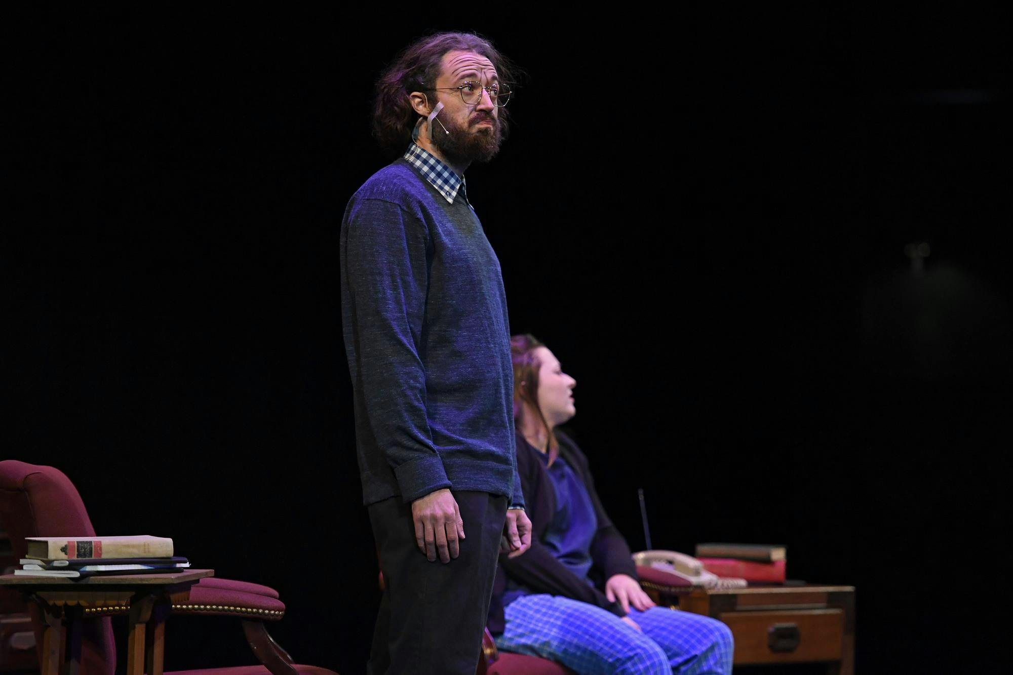 An actor looks out to the audience as a “ten-minute play” is performed on Friday, Jan. 30, 2026, at the Jackson N. Sasser Fine Arts Hall at Santa Fe College in Gainesville, Fla. 