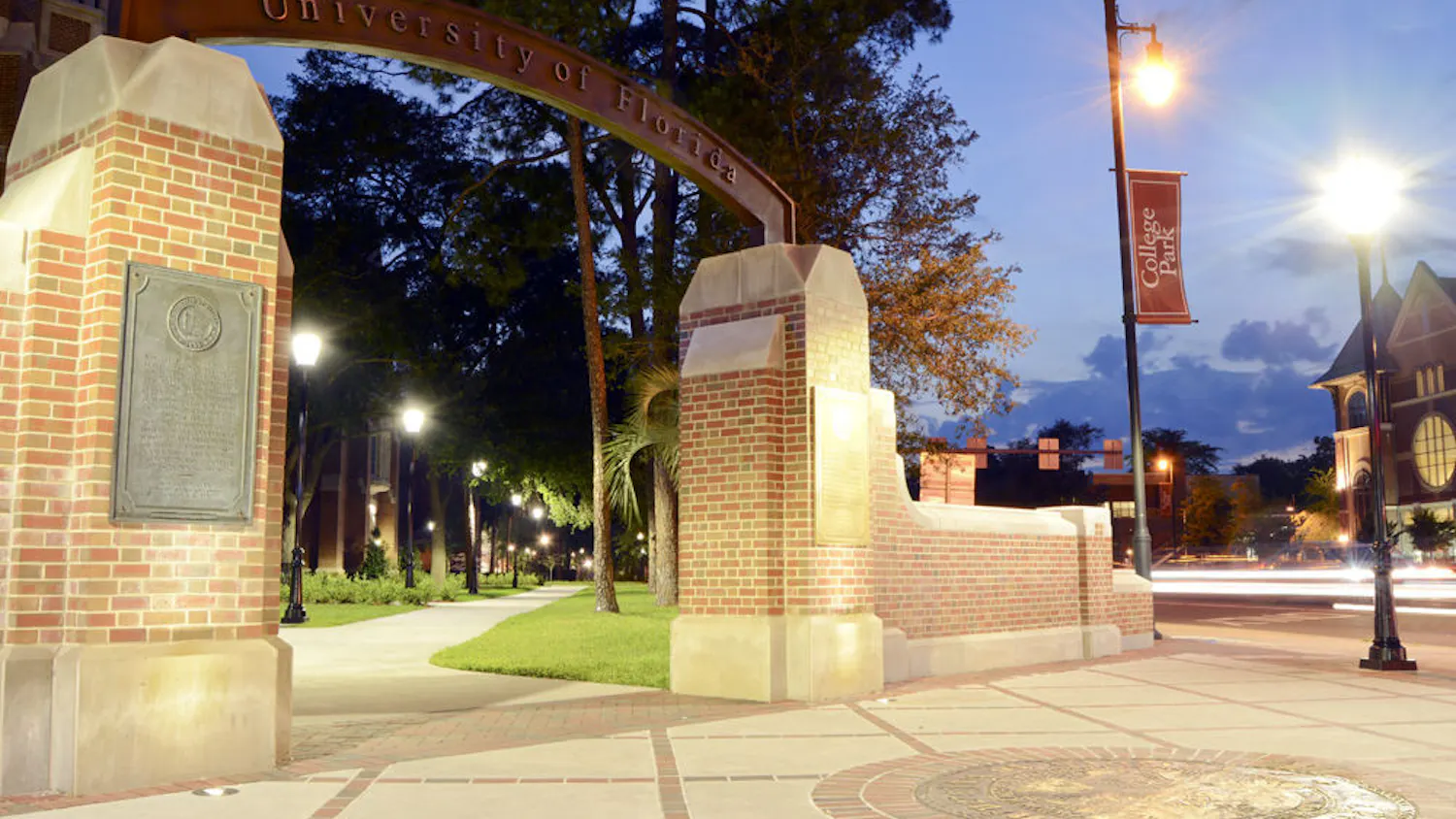 In this long exposure photo, cars drive past the arch near Heavener Hall overlooking West University Avenue and Southwest 13th Street. Summer A classes began yesterday and will run through June 19.