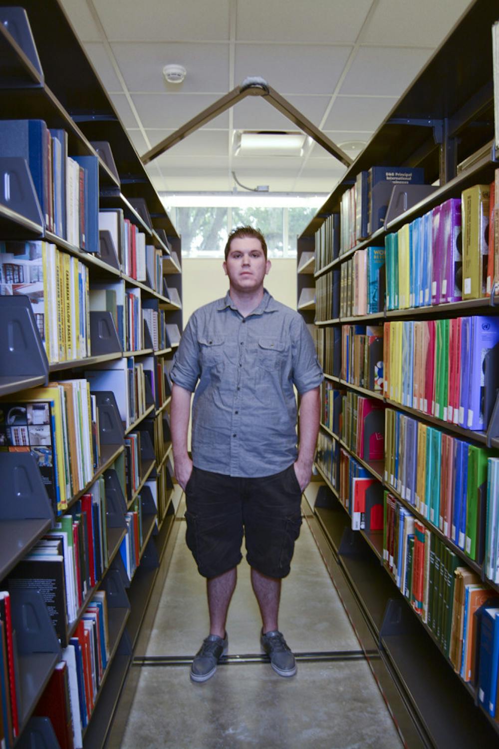 <p>Brandon Fantozzi, a 20-year-old UF anthropology sophomore enrolled in Innovation Academy, poses for a photo on the first floor of Library West. A student on the pre-medicine track to be a physician’s assistant, Fantozzi said he was concerned about falling behind because none of his critical tracking courses are offered during the fall.</p>