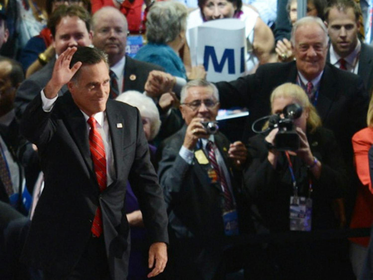Republican presidential candidate Mitt Romney waves at the Republican National Convention at the Tampa Bay Times Forum on Thursday.