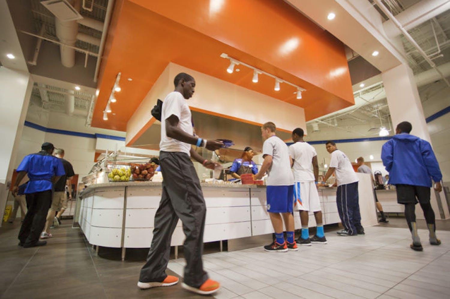 Customers peruse and eat at Gator Corner Dining Center. It reopened Monday after a $2.5 million renovation.