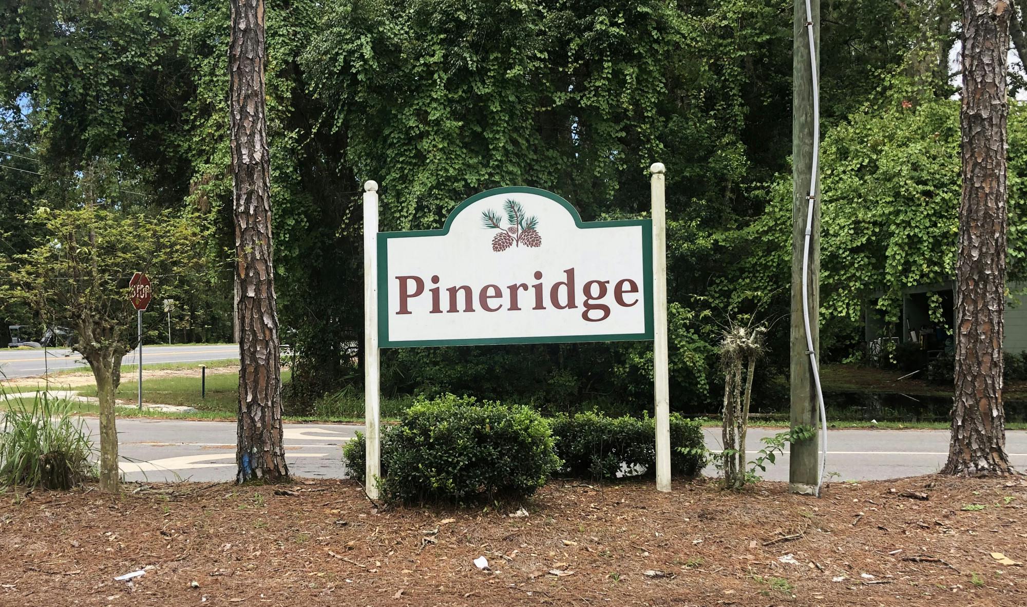 A sign for the Pineridge neighborhood sits at Northwest 34th Boulevard on Saturday, July 10, 2021.