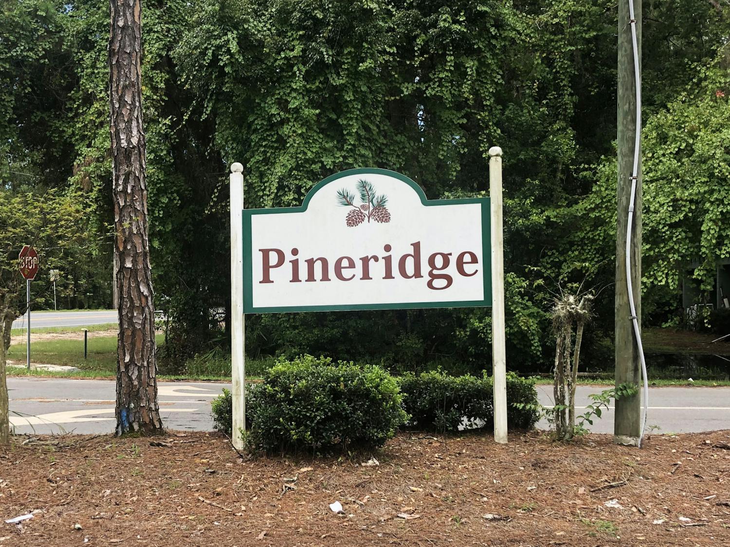 A sign for the Pineridge neighborhood sits at Northwest 34th Boulevard on Saturday, July 10, 2021.
